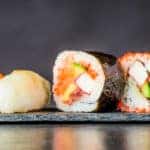 Sushi rolls against a dark background