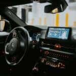 The dashboard of a car with a digital screen