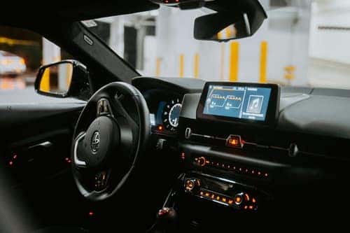 The dashboard of a car with a digital screen