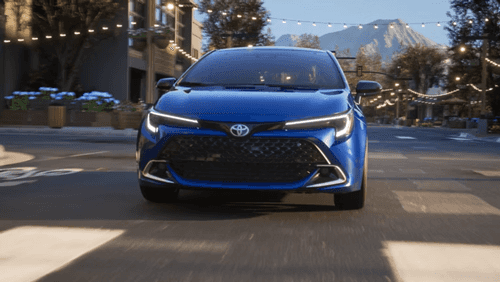 2025 Toyota Corolla Driving Down the Road