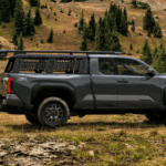 Toyota Tacoma with Worker loading tools
