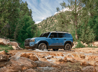 Toyota SUV parked on a hill