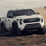 Toyota Tacoma on a Hillside driving in dirt