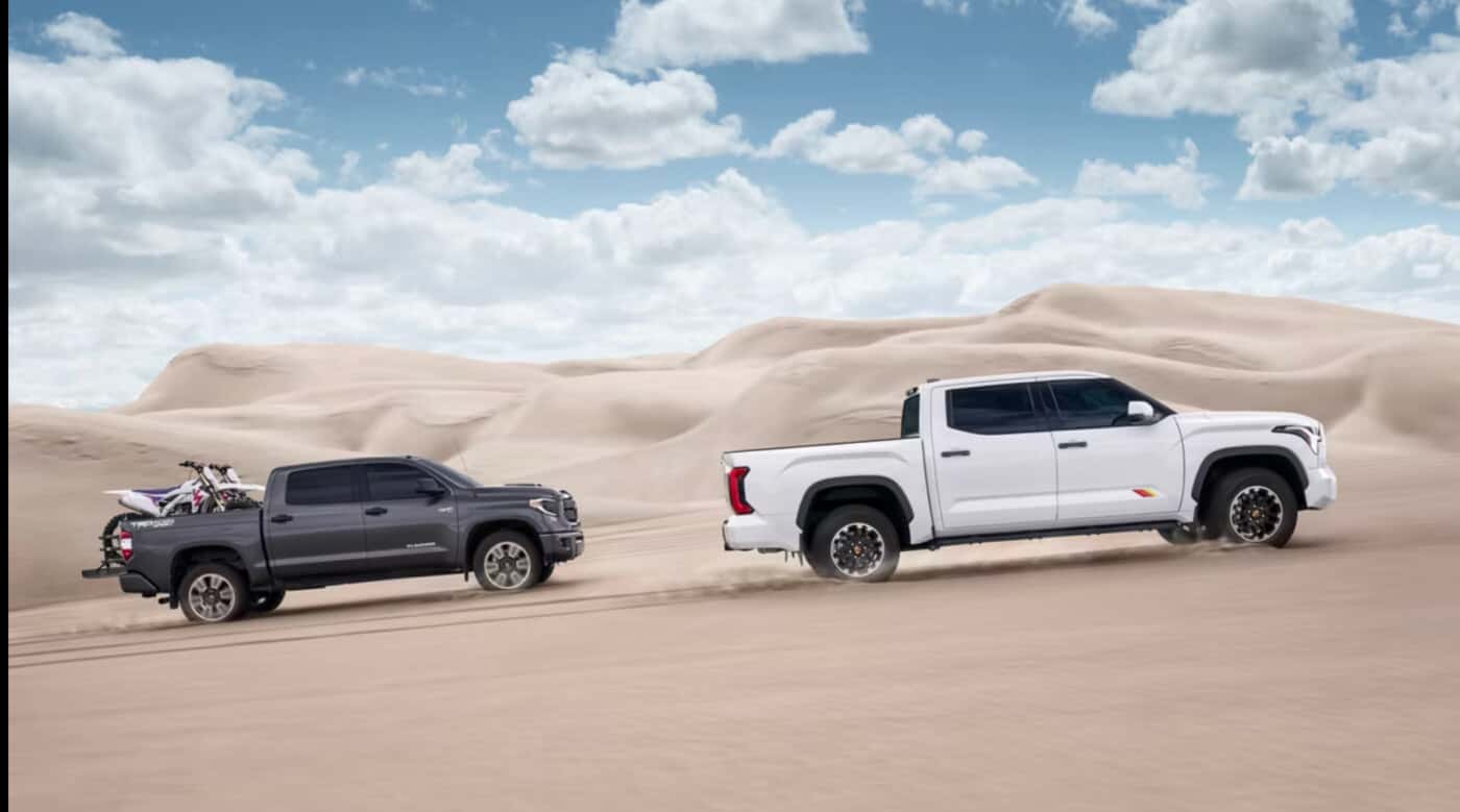 Two Toyota Tundra Racing Through Desert