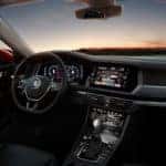 Front seat view inside VW Jetta at dusk