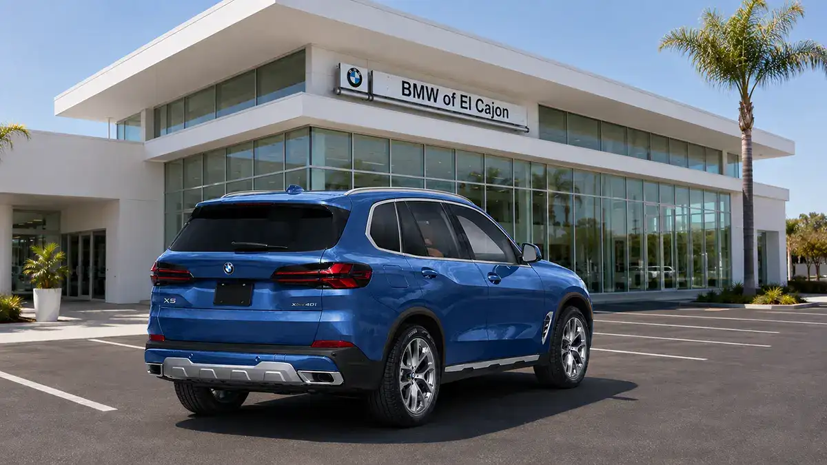 2026 BMW X5 shown from the rear three-quarter angle