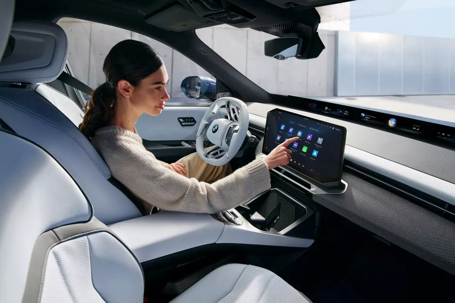 BMW Panoramic iDrive display spanning the full width of the windshield in the 2027 iX3