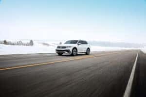 RESIZED - MY24 Tiguan SEL R- Line Oryx White - Running Footage Still - Exterior