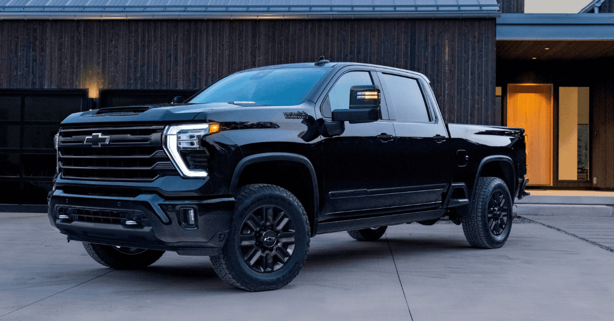 2025 Chevy Silverado 2500HD truck parked in front of a house