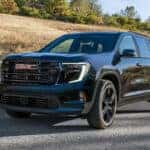 A 2026 GMC Acadia on the road