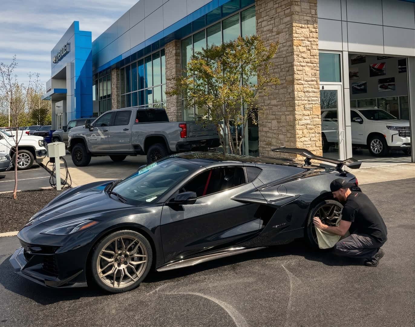 GM World Class Technician Zach detailing a Corvette Z06 outside Chesrown Chevrolet in Delaware Ohio