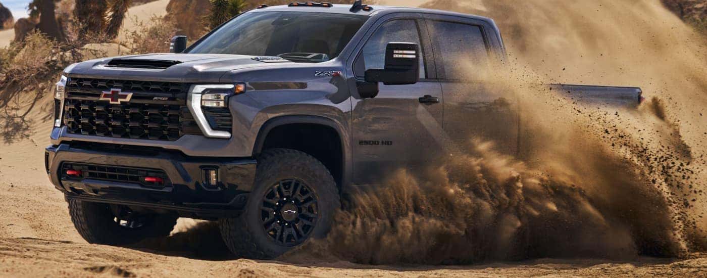 Grey 2026 Chevy Silverado 2500 HD ZR2 drifiting