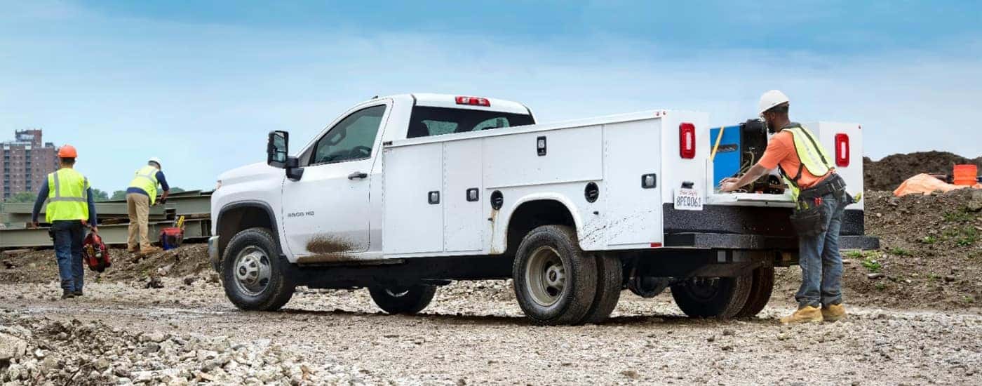 White 2024 Chevy Silverado 3500 HD Chassis Cab on a worksite