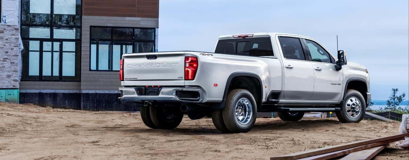 White 2024 Chevy Silverado 3500 HD LTZ parked on a construction site