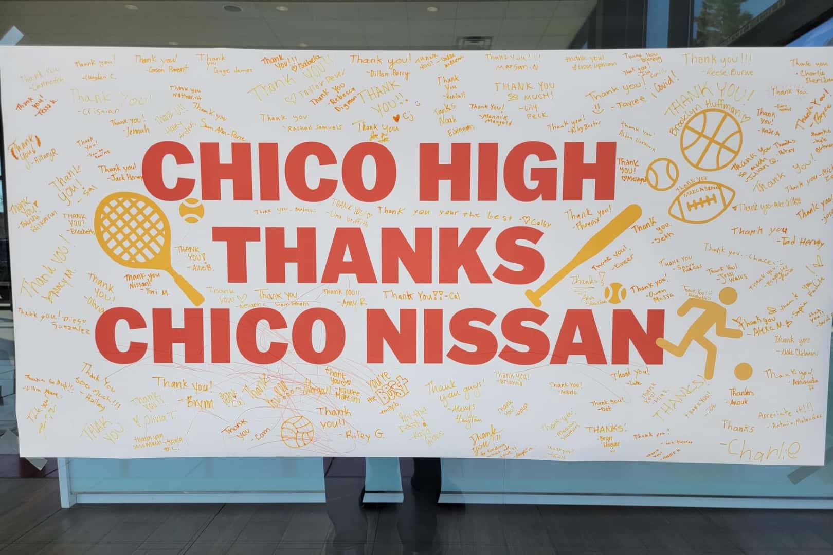 Chico High Thanks Chico Nissan banner with signatures