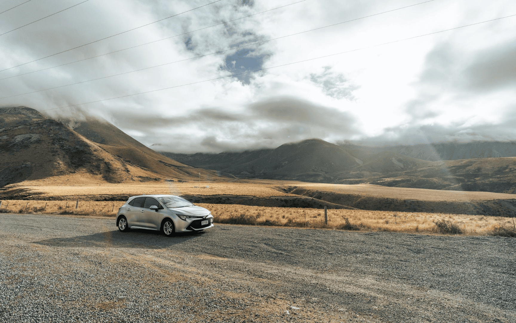 new toyota parked outdoors near the mountains