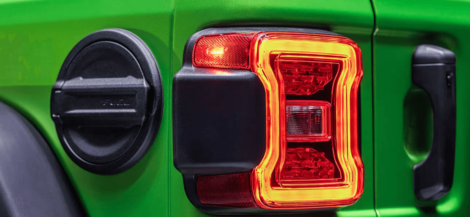 Close-up of a green Jeep Wrangler tail light in Kansas