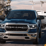 new ram truck tows a boat
