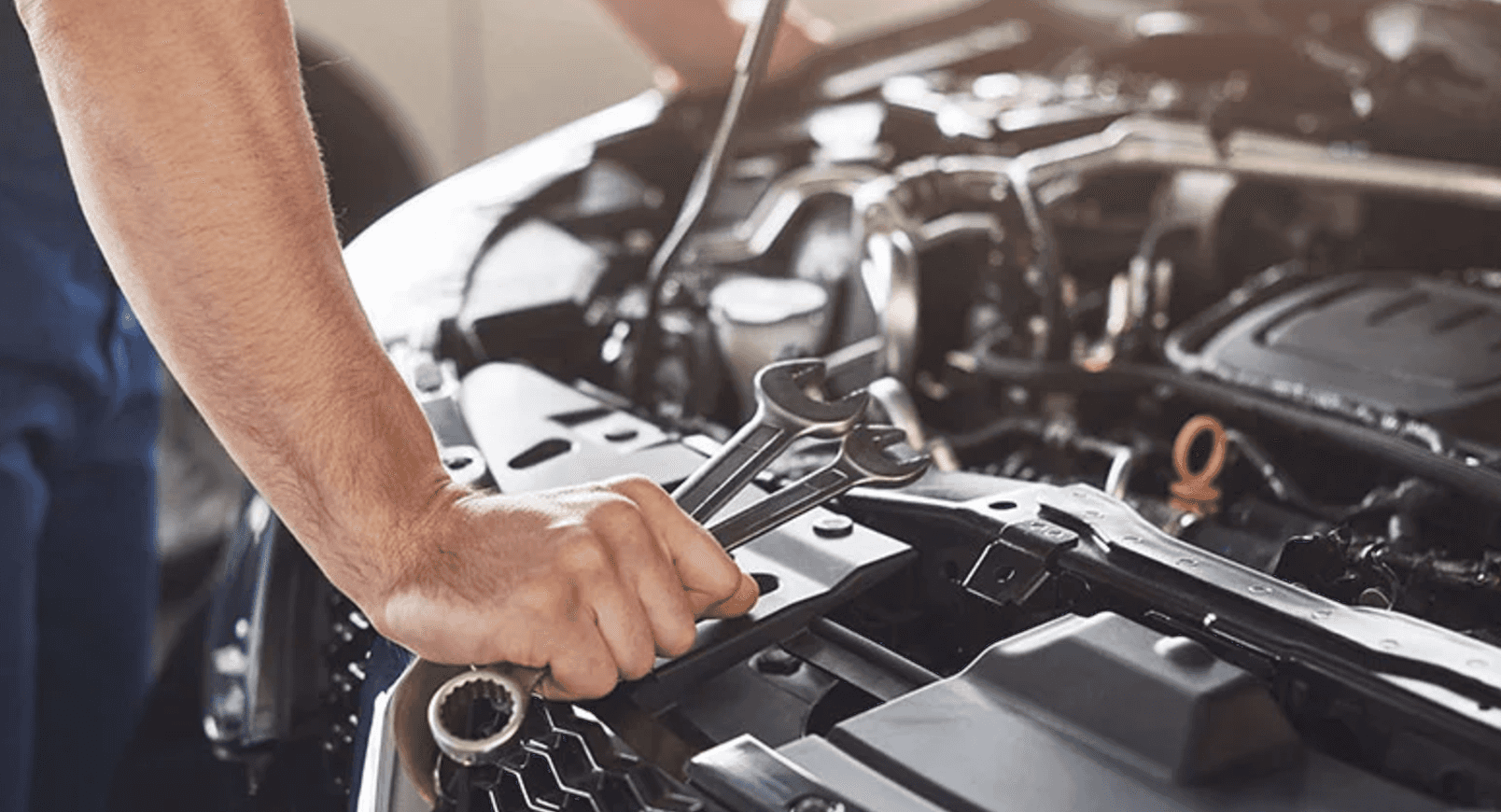 Mechanic working on engine