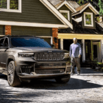 Used Jeep Grand Chrokee from Conklin Newton parked outside a family home in Wichita, KS