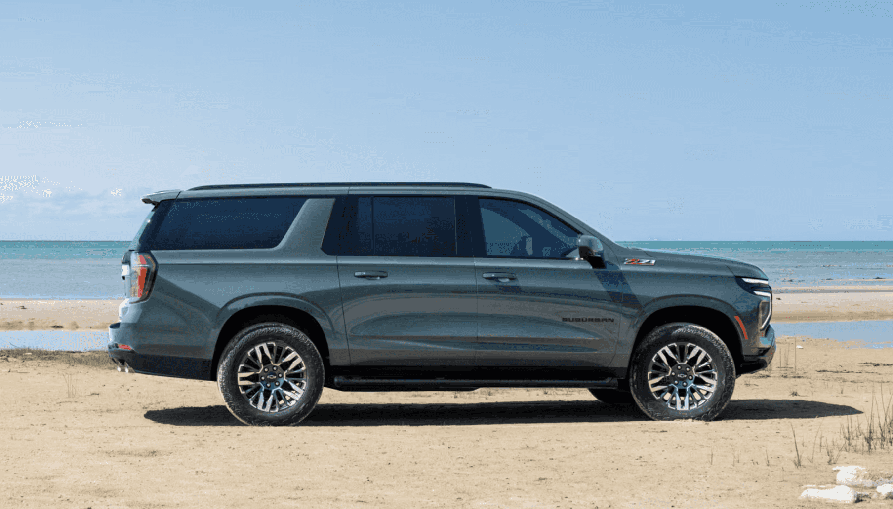 2025 Chevy Suburban parked on the beach