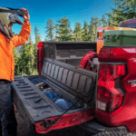 man unpacks the 2024 chevy colorado trail boss