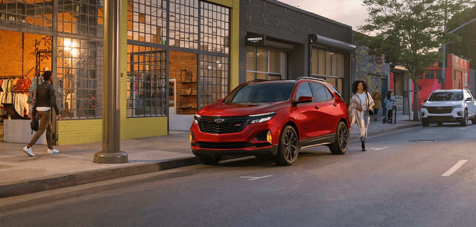 2024 red chevy equinox parked on the street
