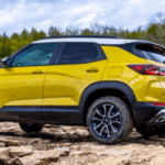 A trailblazer driving through a rocky scenic area