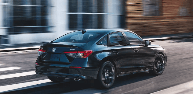 2024 honda civic shown in crystal black pearl