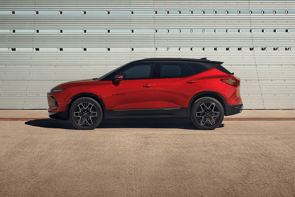 2024 Chevy Blazer parked in front of wall></p><p style=