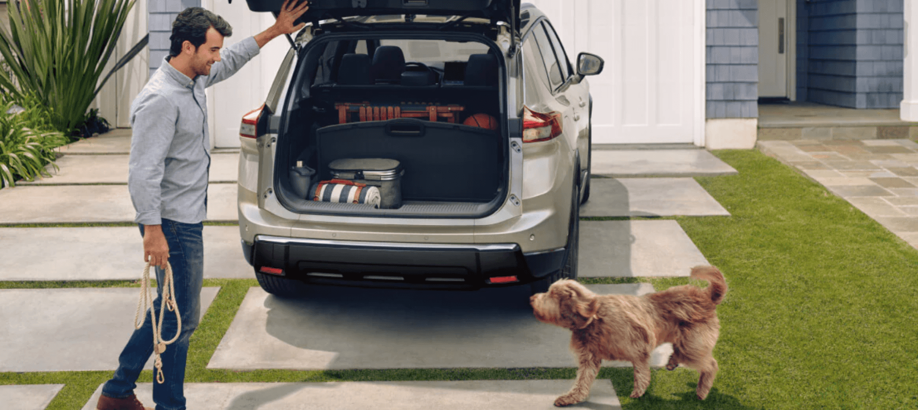Nissan Rogue in a driveway