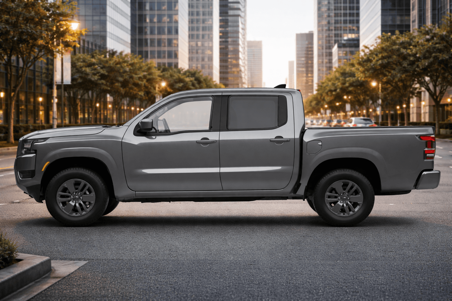 2026 Nissan Frontier parked in a city setting