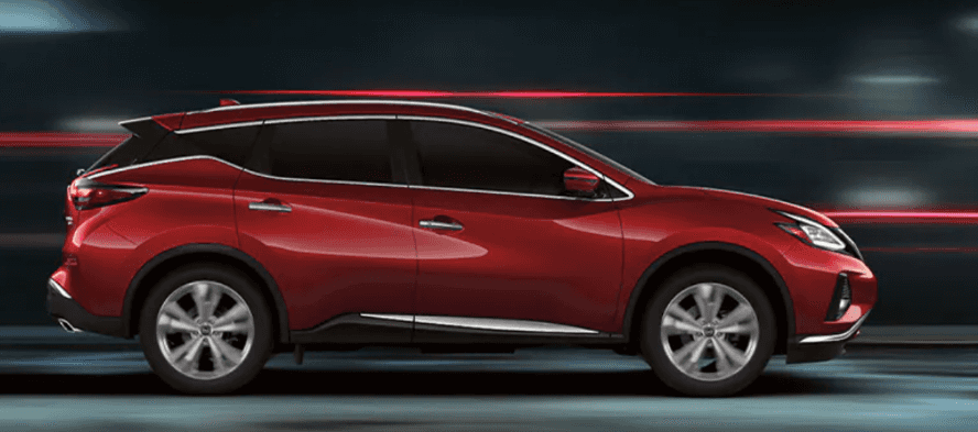 Nissan Murano side profile driving through the streets