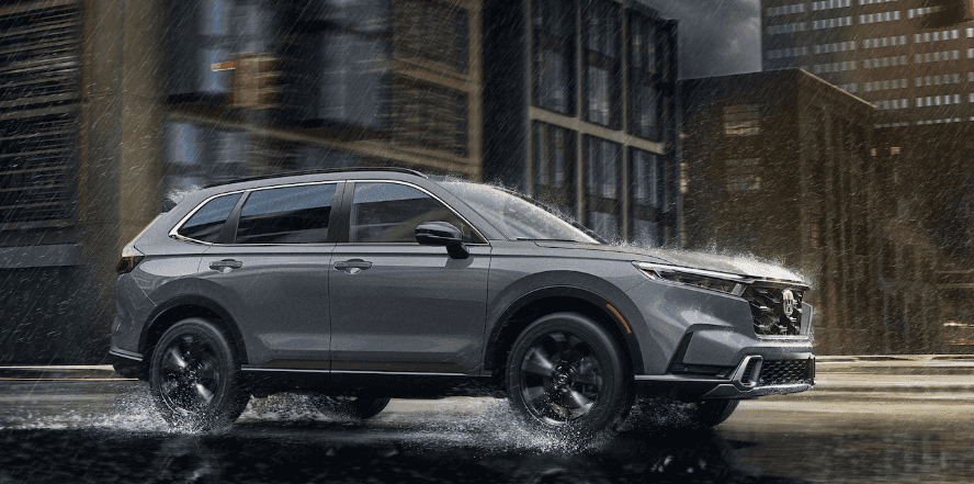 Honda CR-V driving through the rain