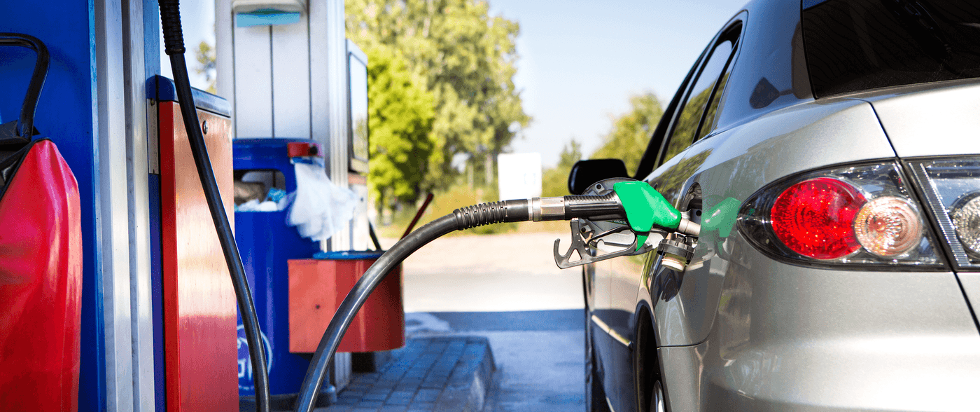 Car Refueling at Gas Station