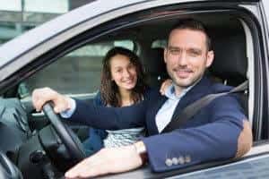Couple in car taking a test drive