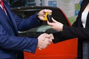 hand shake with new car keys