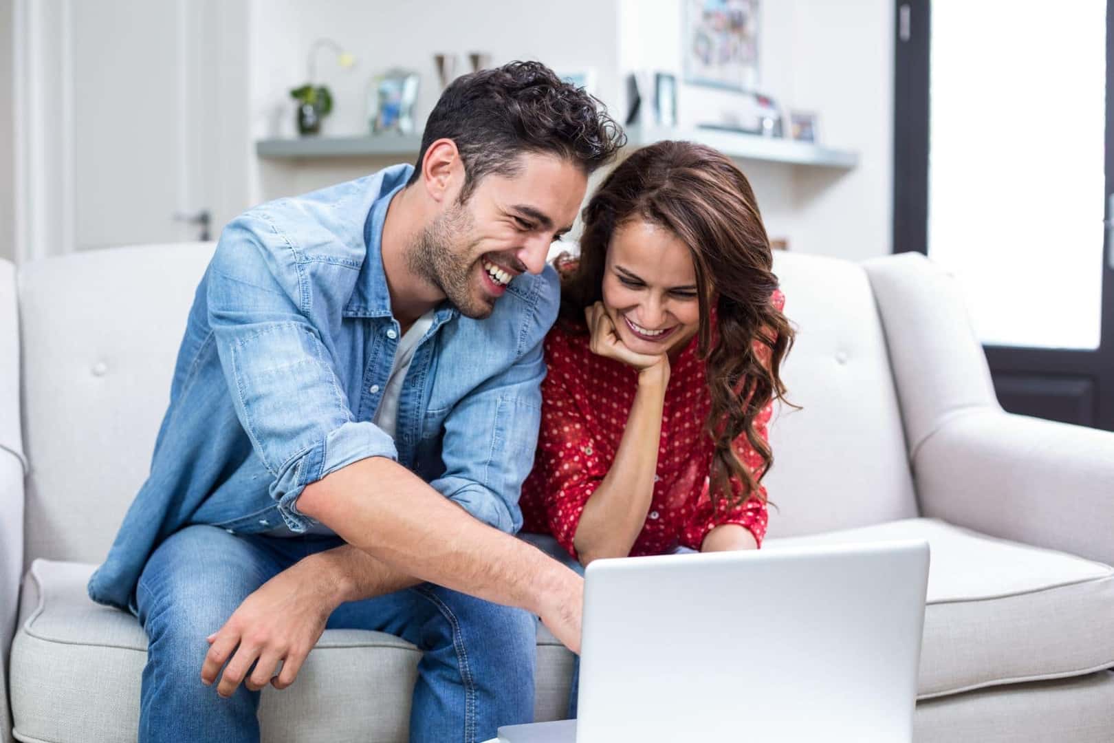 Couple Researching Cars Online