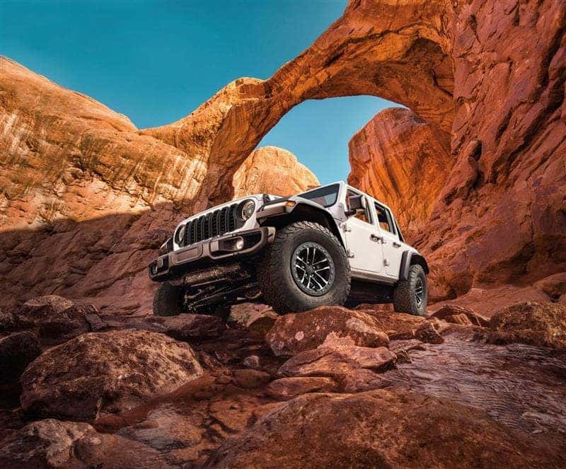 Jeep Wrangler parked on cliff in canyon from Jeep Dealer near Fort Gratiot MI