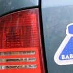 Baby on board sticker on back of car