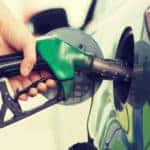 Hand holding gas pump