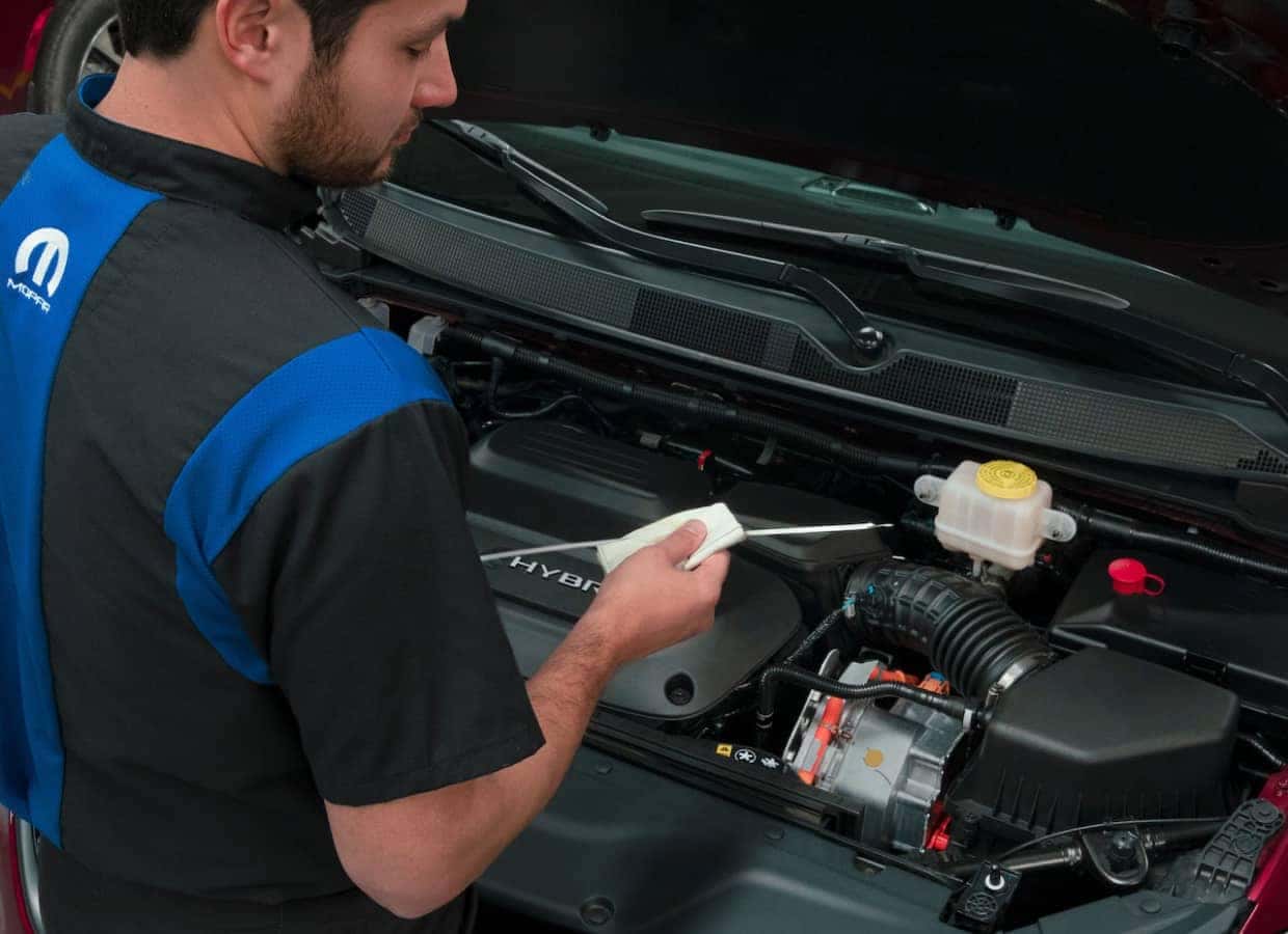 Mechanic working on car