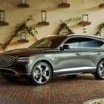 A green 2025 Genesis GV80 vehicle