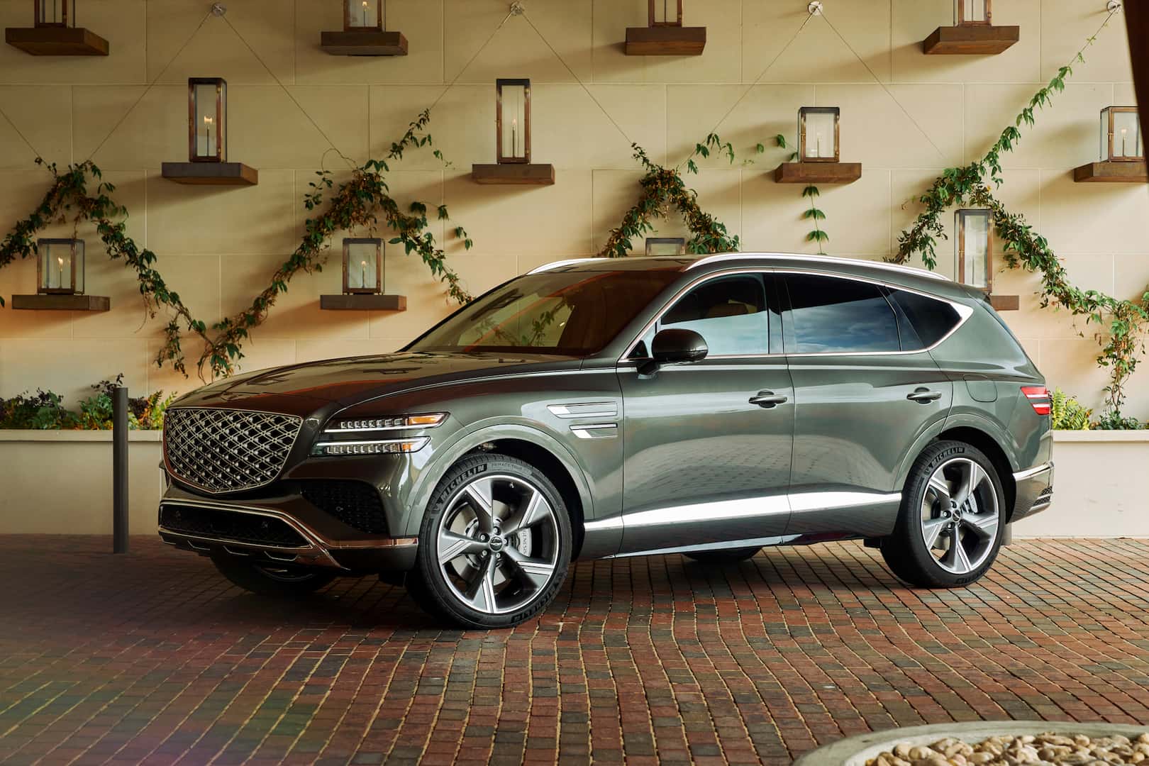 A green 2025 Genesis GV80 vehicle