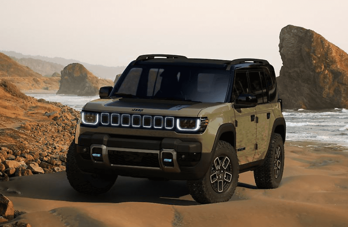 Green Jeep Recon at Hebert's Town and Country Chrysler Dodge Jeep Ram in Shreveport, Louisiana