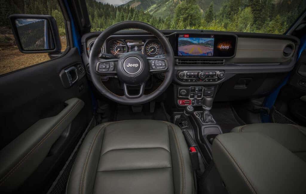 The interior dashboard of the 2025 Jeep Gladiator.