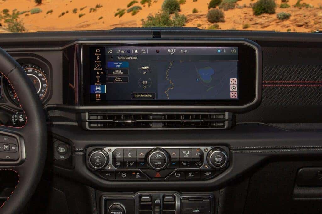 The dashboard showcasing the infotainment screen on the 2025 Jeep Wrangler.