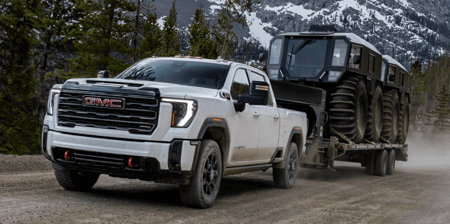 New GMC Sierra 3500 Truck towing through the mountains