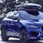 2019 Jaguar F-PACE in blu with roof rack and cargo box