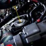engine oil poured into engine for maintenance